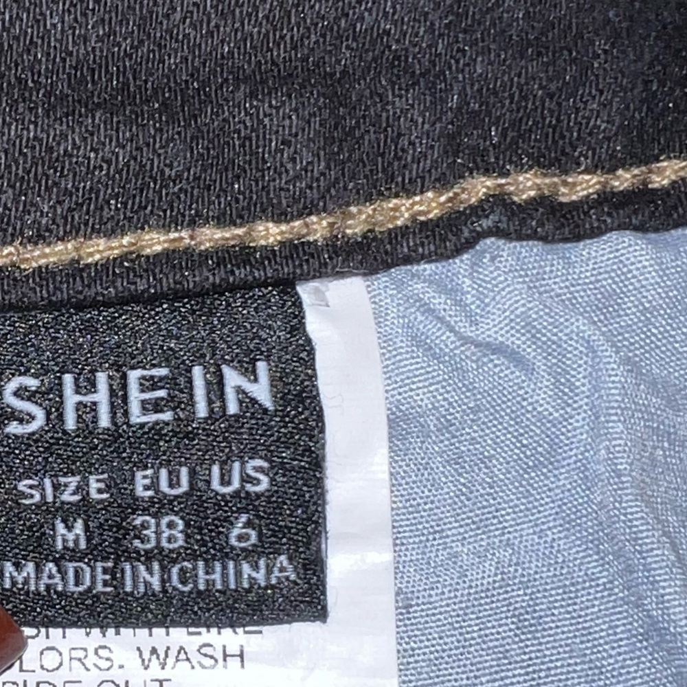 Black and blue patched jeans